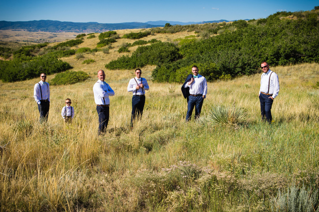 Groomsmen posing for their photographer