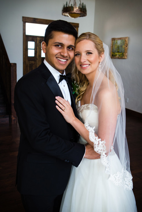 Bride and groom being photographed