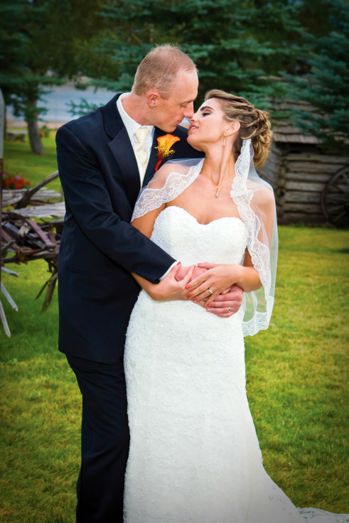 Bride and groom posing on their wedding day